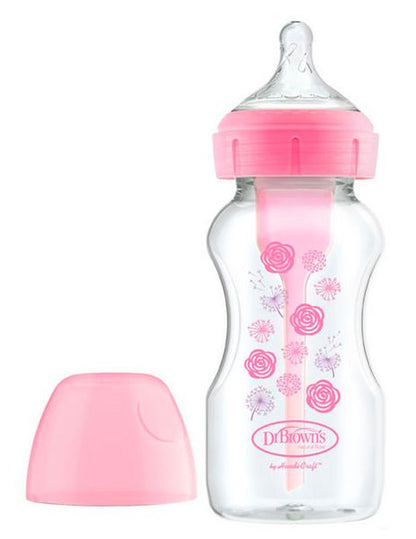 Un biberón transparente de Dr. Brown’s con tapa y base en color rosa, con un diseño floral y el tapón al lado. Es el Biberón Boca Ancha 270ml PP Options+ Tetina Nivel 2. Aprovecha las ofertas de parafarmacia infantil y añade este encantador artículo a los imprescindibles de tu bebé.