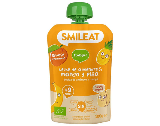 La leche de almendras, el puré de mango y piña de Smileat se presenta en una bolsa reciclable con tapa verde e imágenes de frutas de dibujos animados, ideal para bebés mayores de 9 meses. Busca ofertas en parafarmacia infantil para explorar más productos para bebés con entrega gratis disponible en Mallorca.
